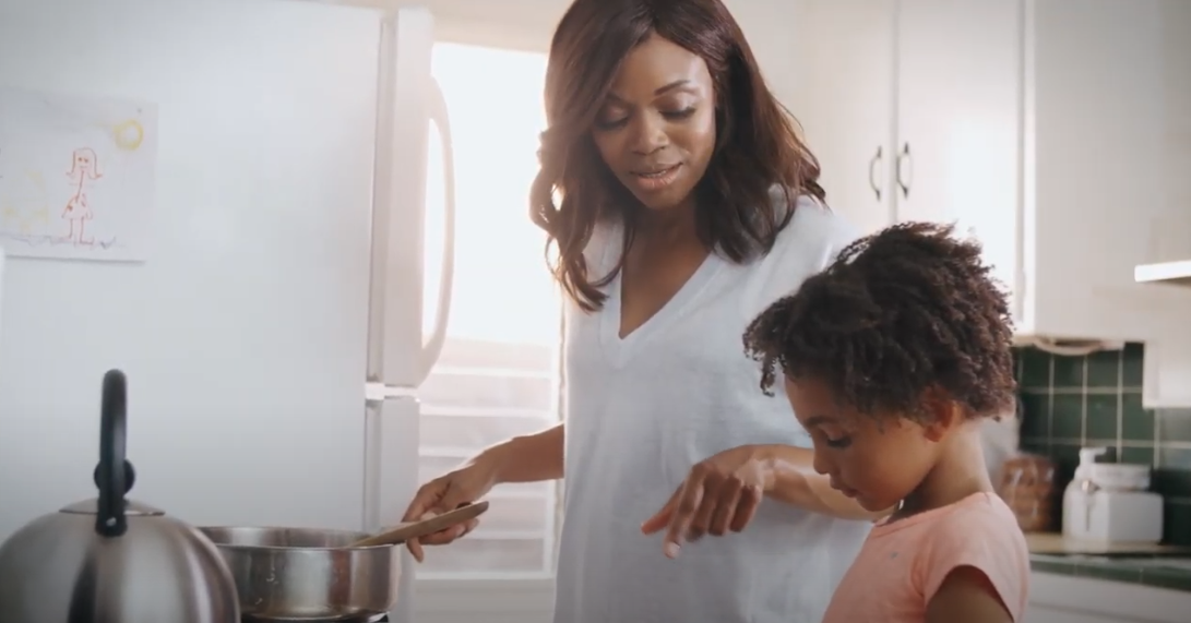 a family cooking with farberware skillets