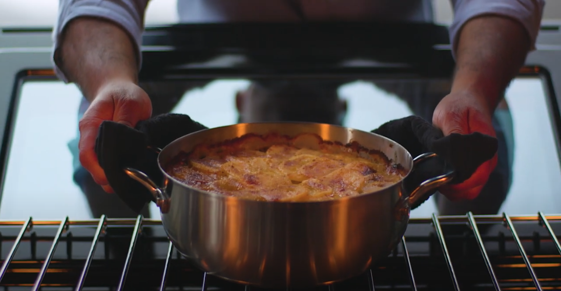 farberware cookware with potatoes in the oven