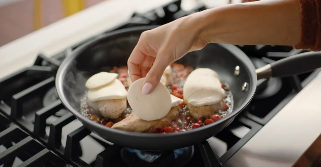 anolon cookware with cheese and chicken cooking